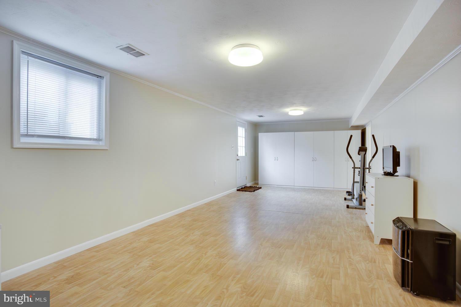 256 Magothy Bridge Road Pasadena, MD 21122 - Photo 16 of 24 a view of a room with gym equipment