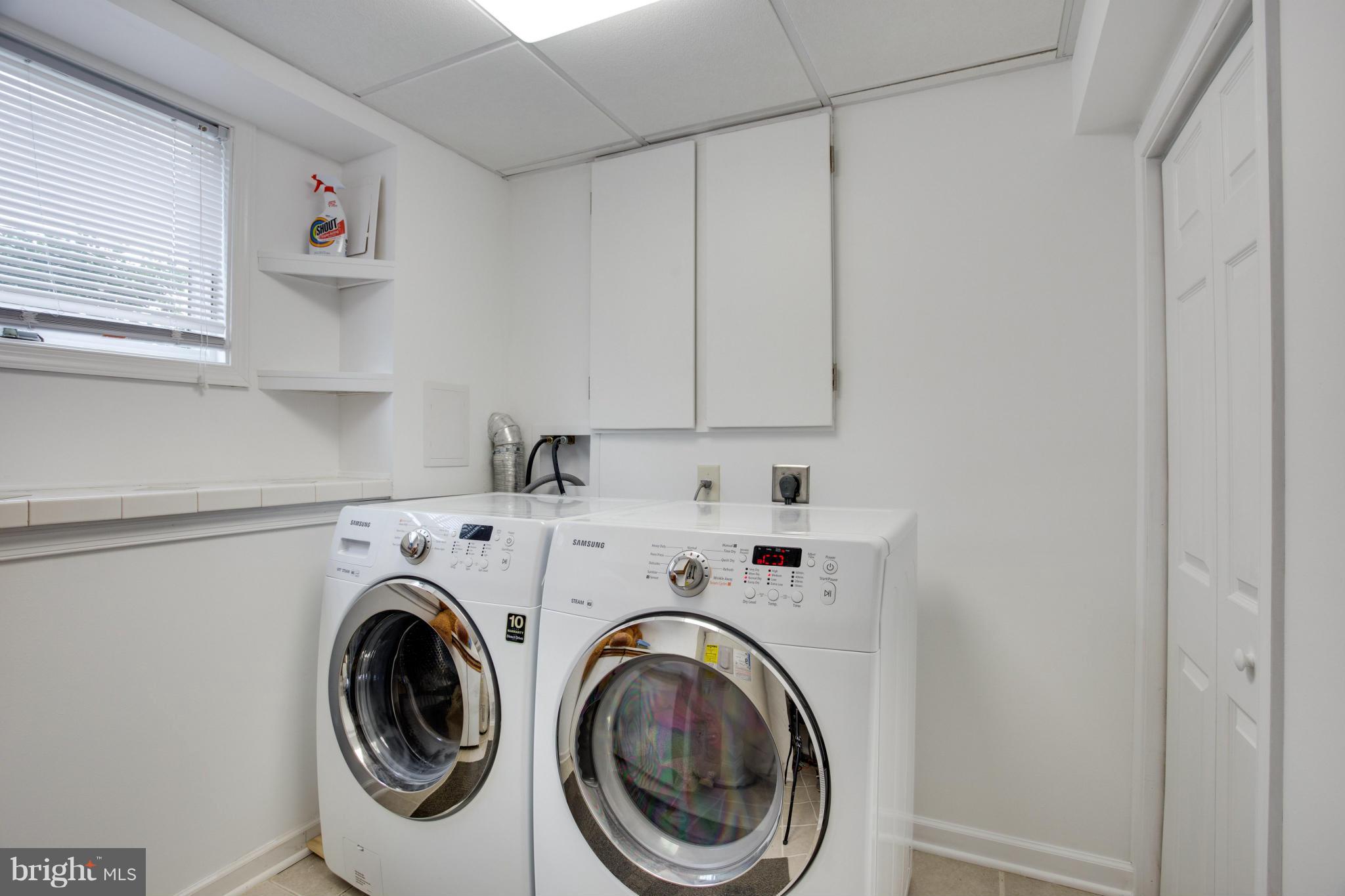 256 Magothy Bridge Road Pasadena, MD 21122 - Photo 21 of 24 a utility room with dryer and washer