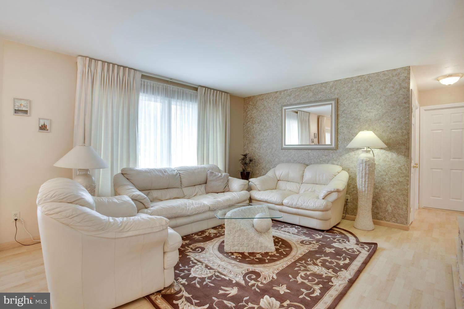256 Magothy Bridge Road Pasadena, MD 21122 - Photo 10 of 24 a living room with furniture and a couch