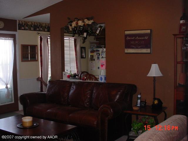 6908 Devonshire Road Amarillo, TX 79109 - Photo 3 of 10 Living Area to Kitchen