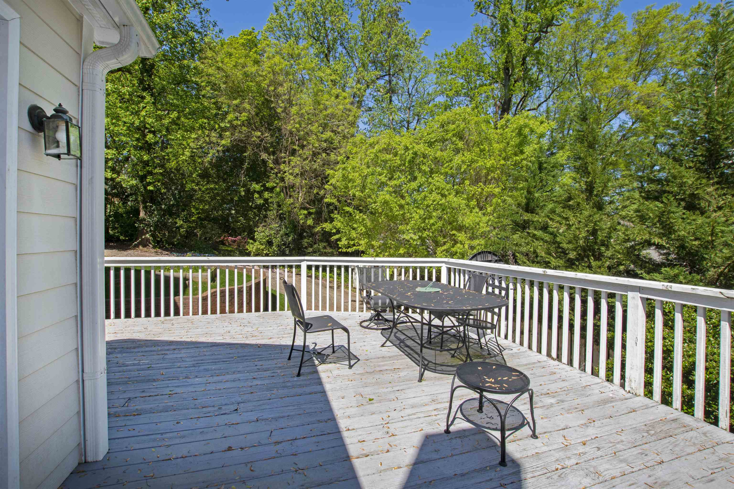 2610 Dover Road Raleigh, NC 27608 - Photo 20 of 20 a view of a wooden chairs on deck
