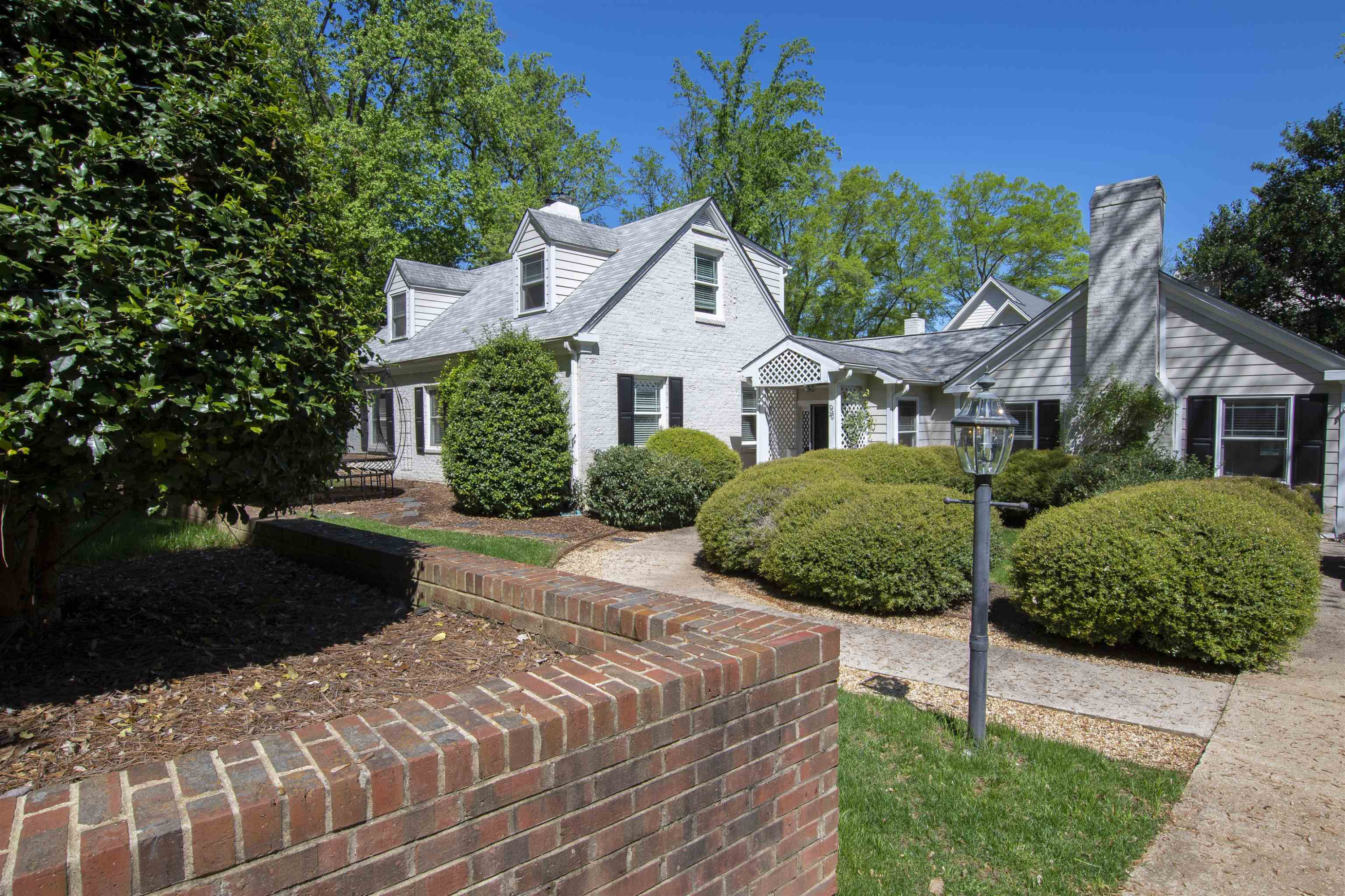 2610 Dover Road Raleigh, NC 27608 - Photo 4 of 20 a front view of a house with a yard and garage