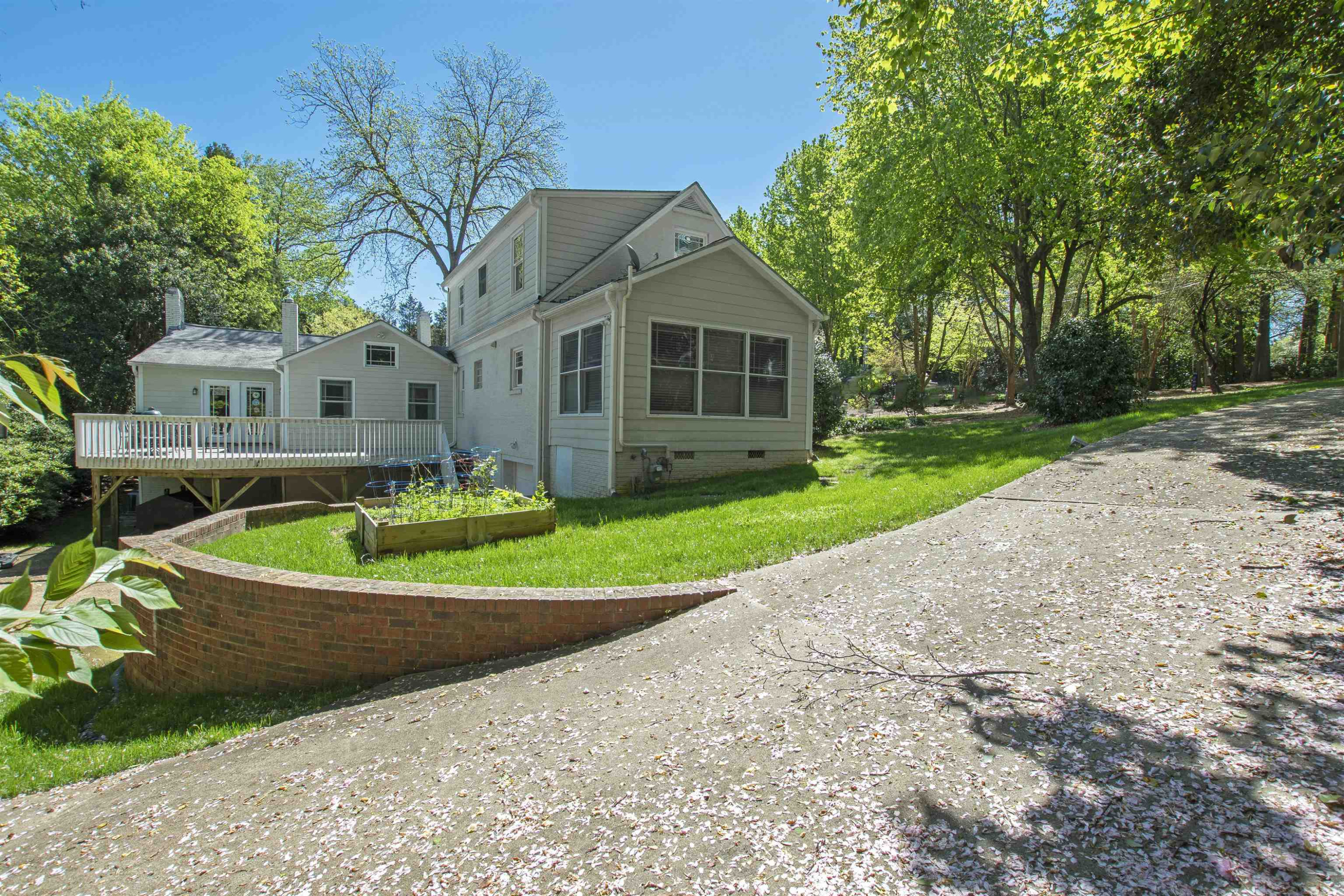 2610 Dover Road Raleigh, NC 27608 - Photo 5 of 20 a front view of a house with a yard and trees