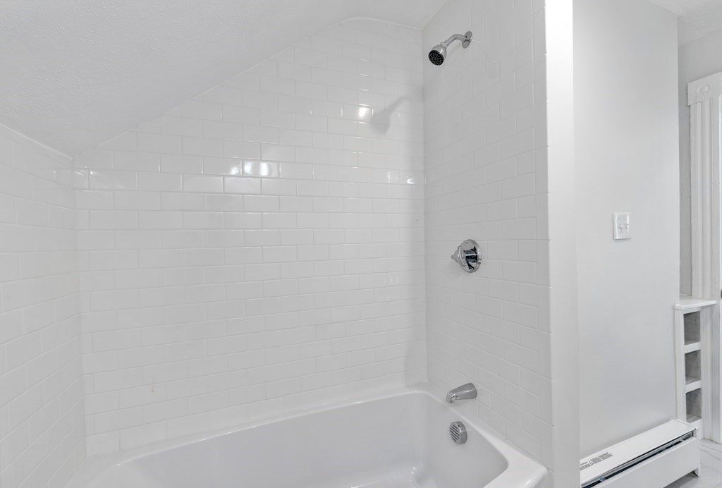 42 Mott Street Fall River, MA 02721 - Photo 16 of 36 a bathroom with a bathtub