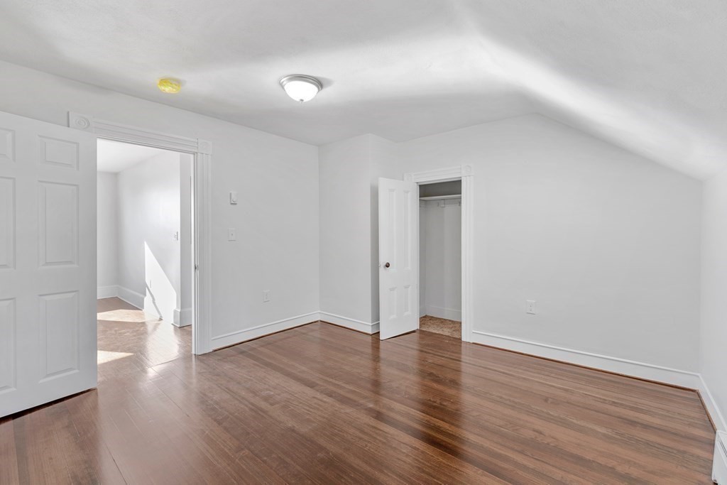 42 Mott Street Fall River, MA 02721 - Photo 23 of 36 a view of an empty room with wooden floor