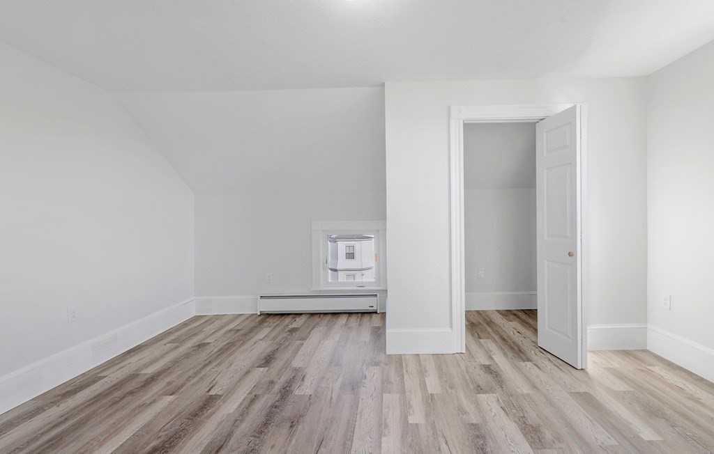 42 Mott Street Fall River, MA 02721 - Photo 28 of 36 a view of empty room with wooden floor