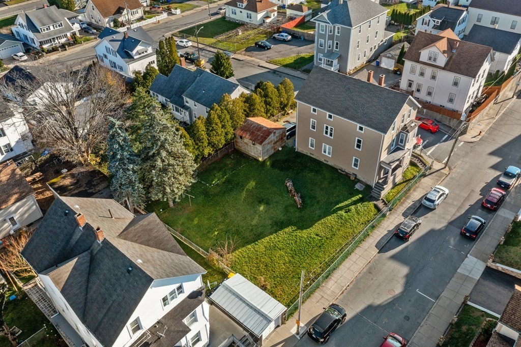 42 Mott Street Fall River, MA 02721 - Photo 36 of 36 an aerial view of a house with a garden and swimming pool