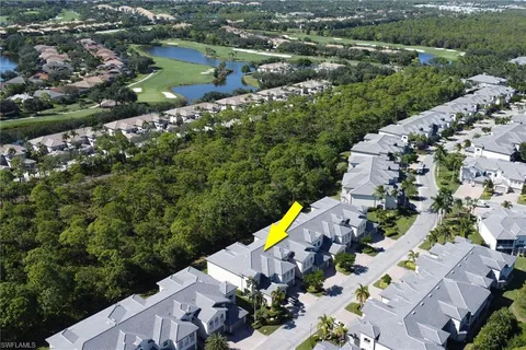 an aerial view of a city with mountains