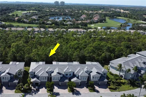 an aerial view of a yard with green space