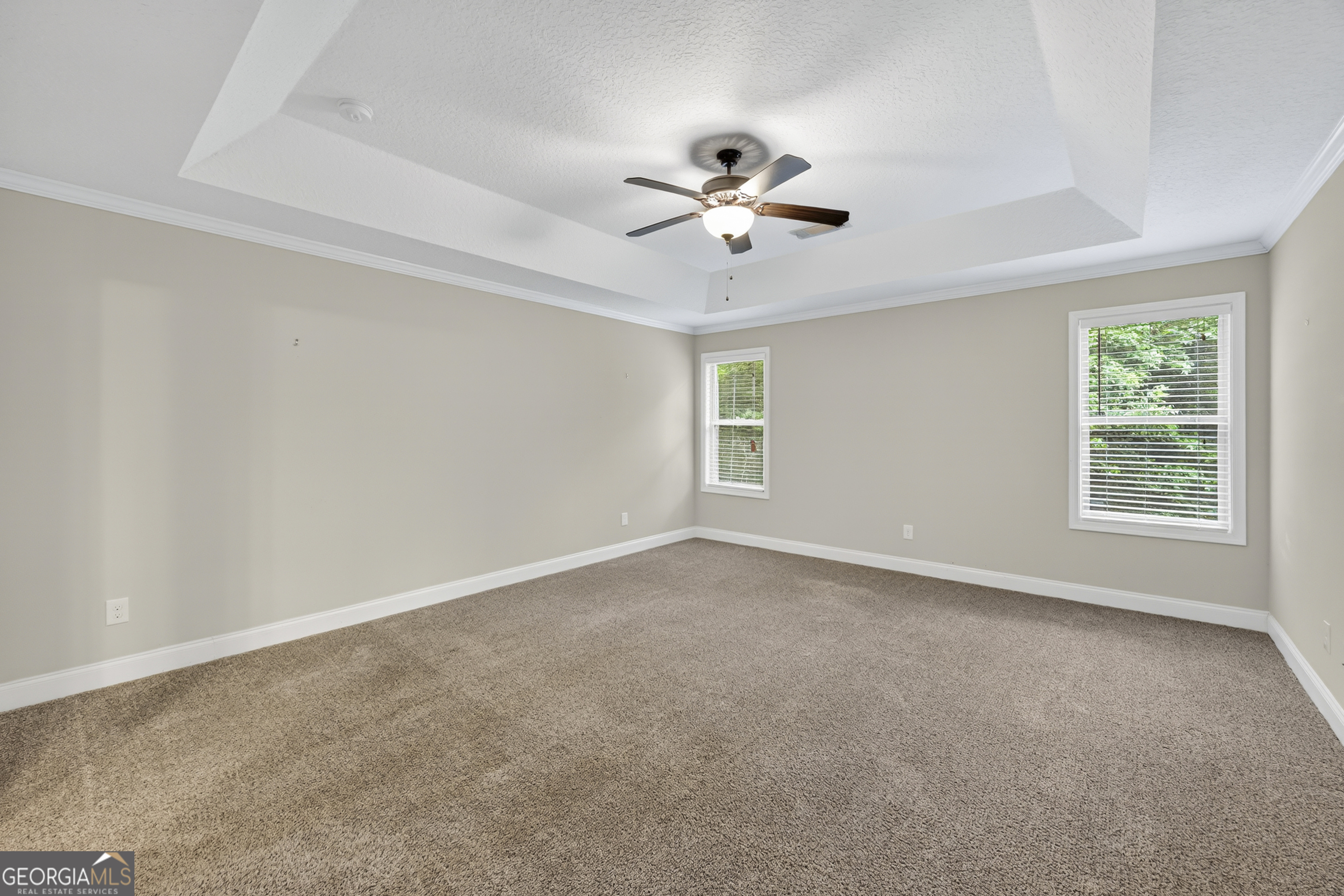 717 Oconee Lane Commerce, GA 30529 - Photo 17 of 57 a view of an empty room with a window