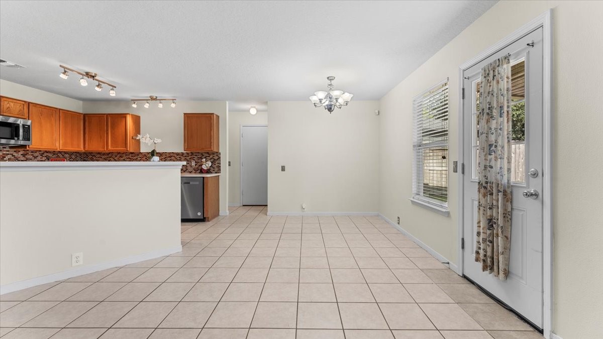 527 Cypresswood Knoll Spring, TX 77373 - Photo 19 of 45 a view of a kitchen with a sink
