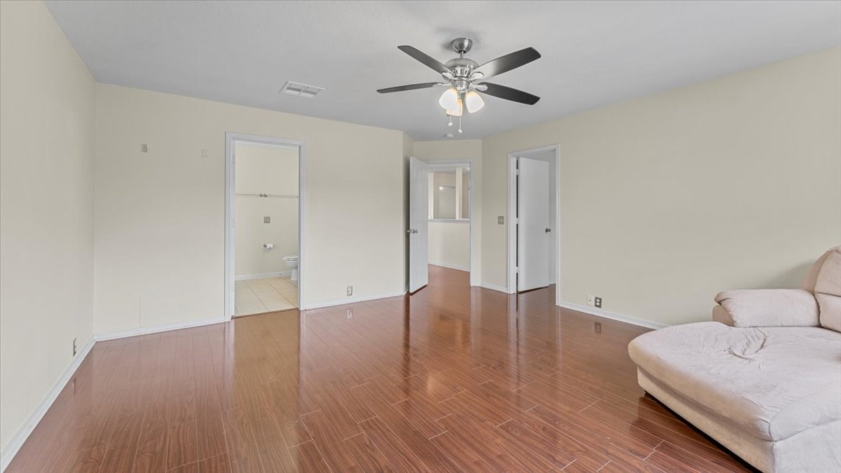 527 Cypresswood Knoll Spring, TX 77373 - Photo 28 of 45 a view of a livingroom with wooden floor and furniture