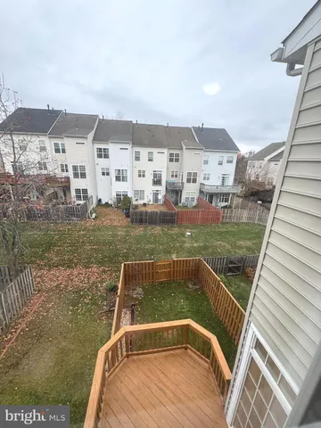 a view of swimming pool with outdoor seating