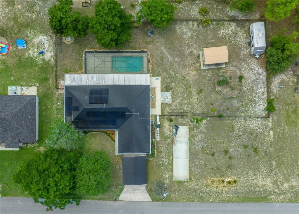 234 Locust Lane Ocala, FL 34472 - Photo 12 of 71 an aerial view of a house with a yard