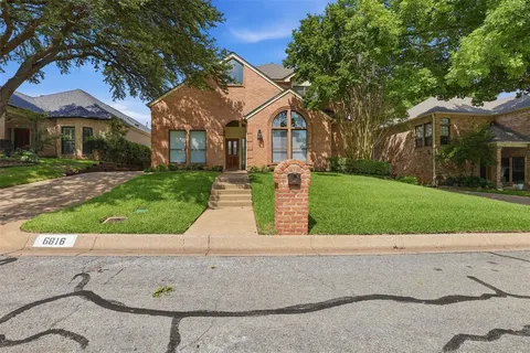 a front view of house with yard