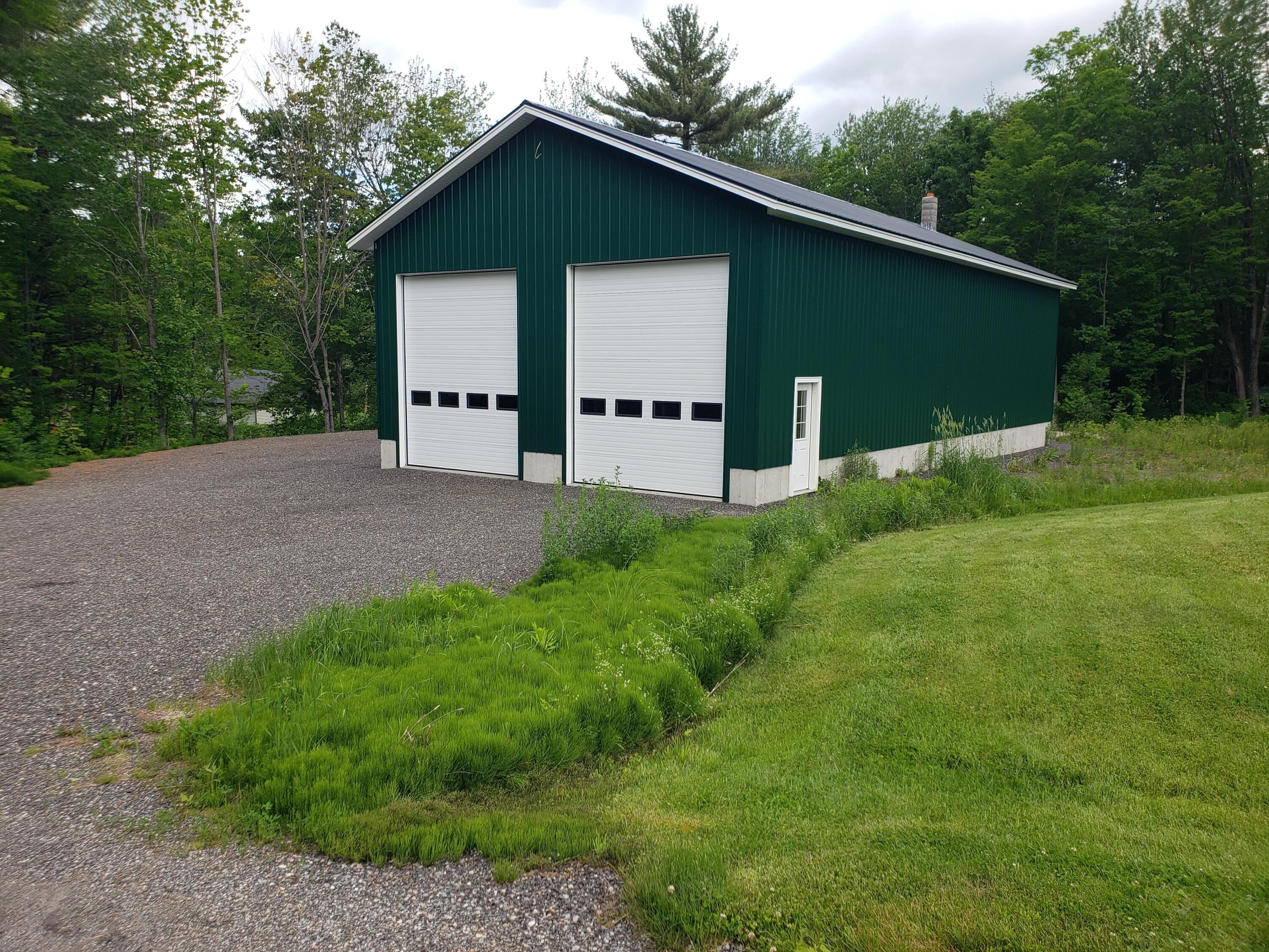 306 Gibbs Mill Road Livermore, ME 04253 - Photo 12 of 52 32 x 64 Garage w/ 16 foot ceiling.