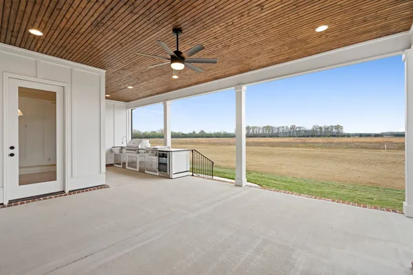 a view of a lake in front of the house