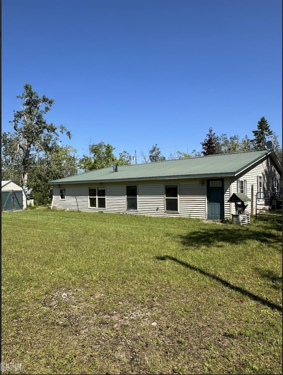 16865 Grace Harbor Road Millersburg, MI 49759 - Photo 3 of 35