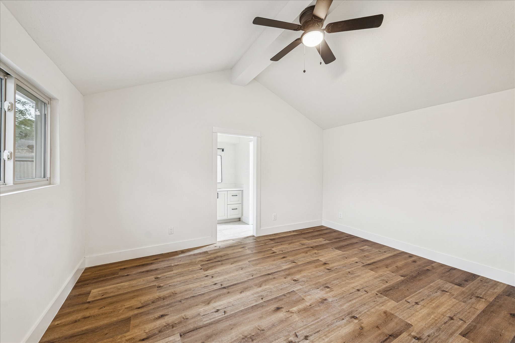 3623 Acorn Way Lane Spring, TX 77389 - Photo 13 of 22 an empty room with wooden floor ceiling fan and windows