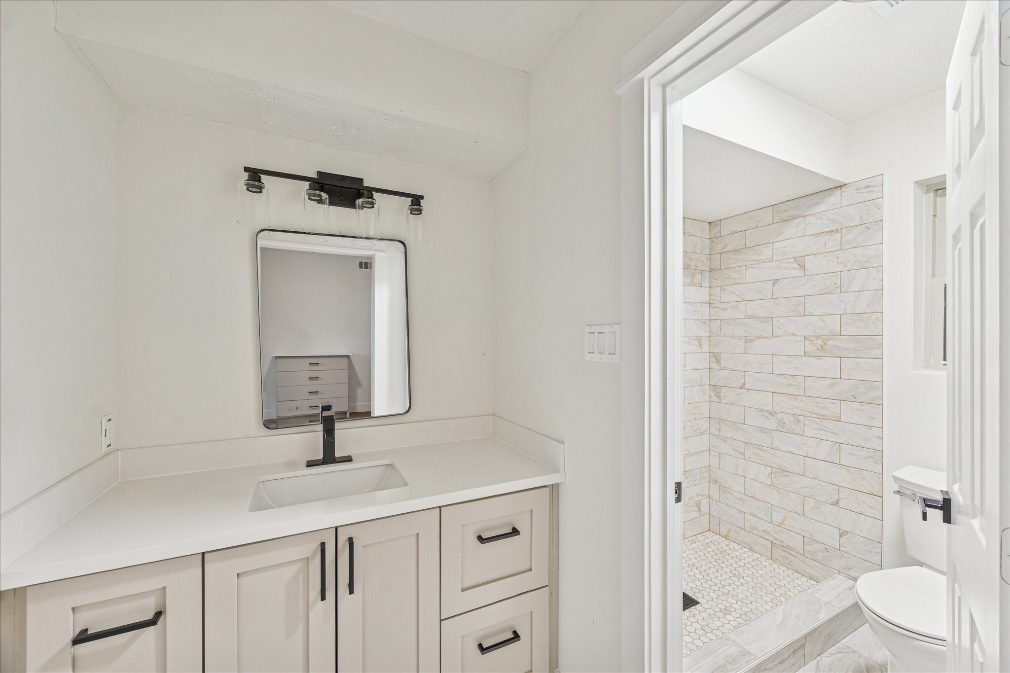 3623 Acorn Way Lane Spring, TX 77389 - Photo 14 of 22 a bathroom with a toilet sink and shower