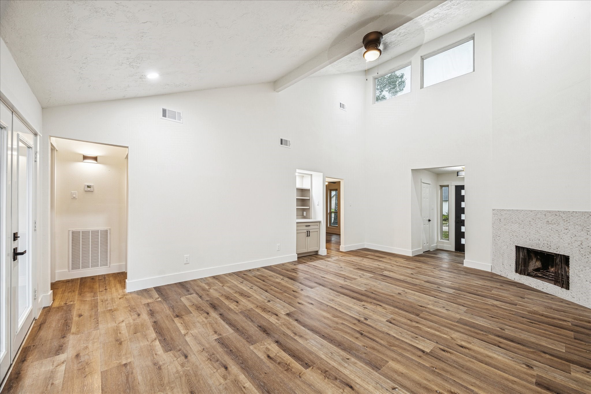 3623 Acorn Way Lane Spring, TX 77389 - Photo 5 of 22 a view of empty room with wooden floor and fireplace