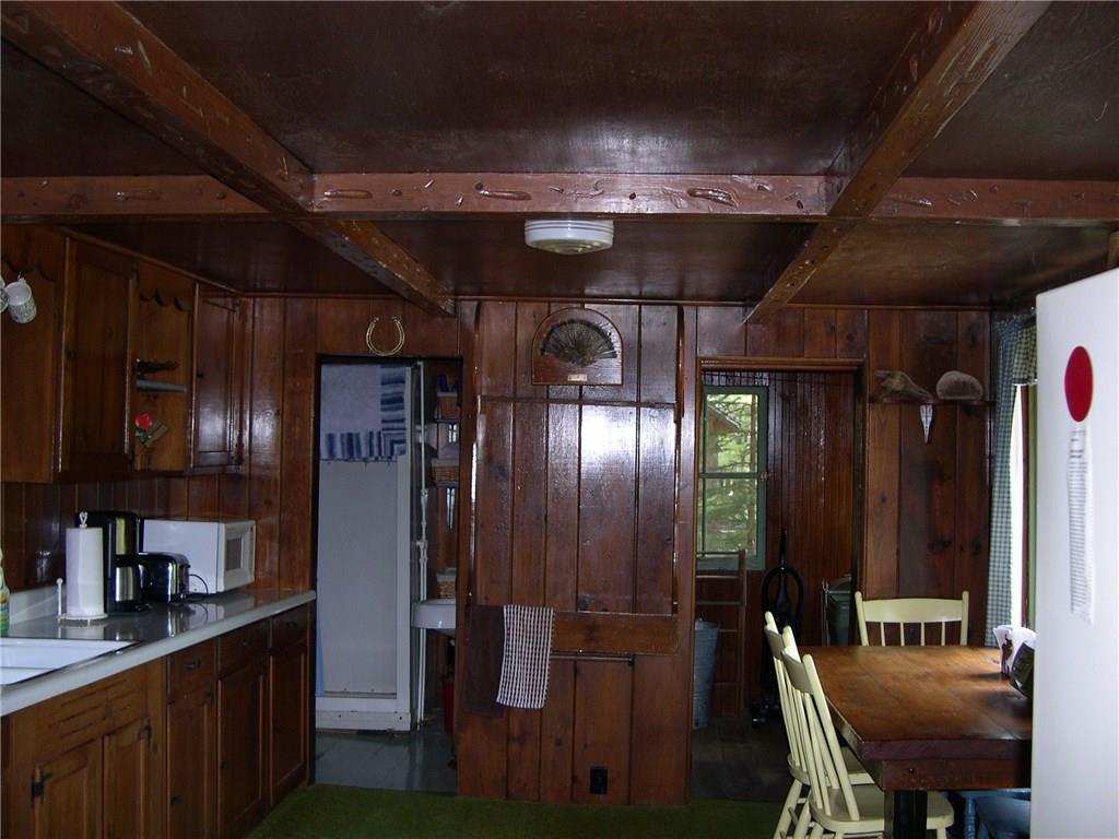 279 Dodge Pond Road, Unit 5 Rangeley, ME 04970 - Photo 10 of 35 spacious kitchen area