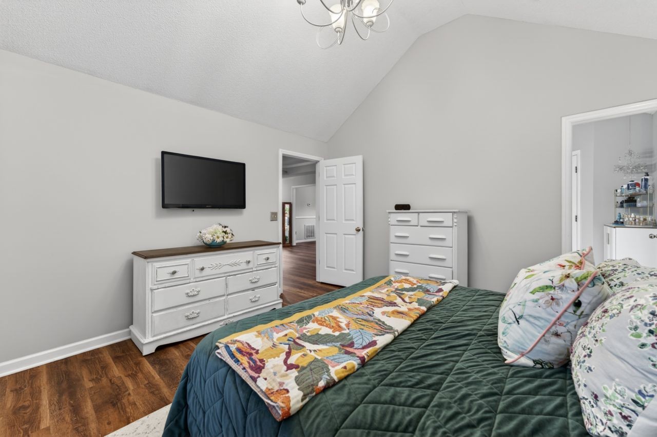 3740 Nicklaus Way Murfreesboro, TN 37128 - Photo 25 of 48 a bedroom with a bed and flat screen tv
