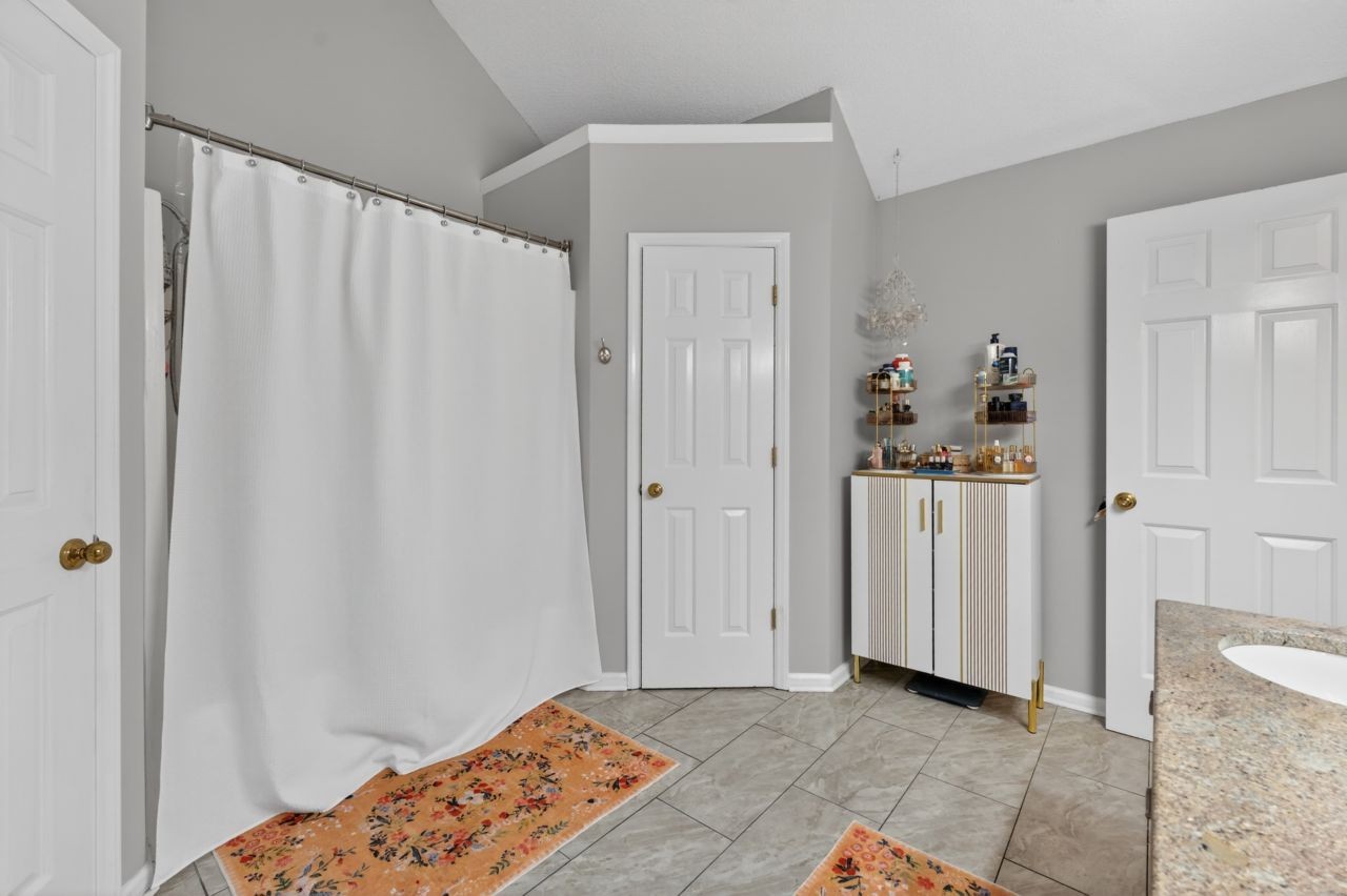 3740 Nicklaus Way Murfreesboro, TN 37128 - Photo 28 of 48 a view of a bedroom with wooden floor and closet
