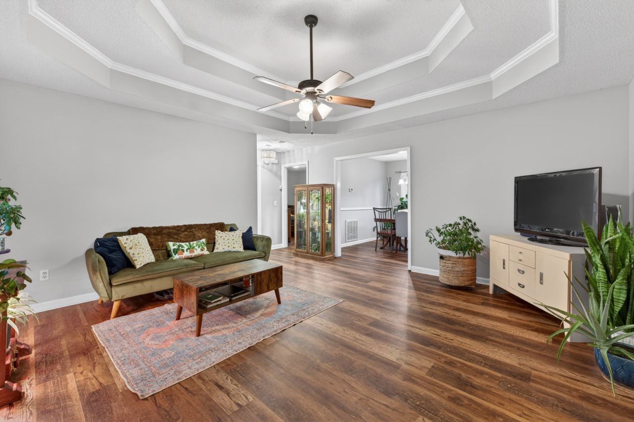 3740 Nicklaus Way Murfreesboro, TN 37128 - Photo 8 of 48 a living room with furniture and a flat screen tv