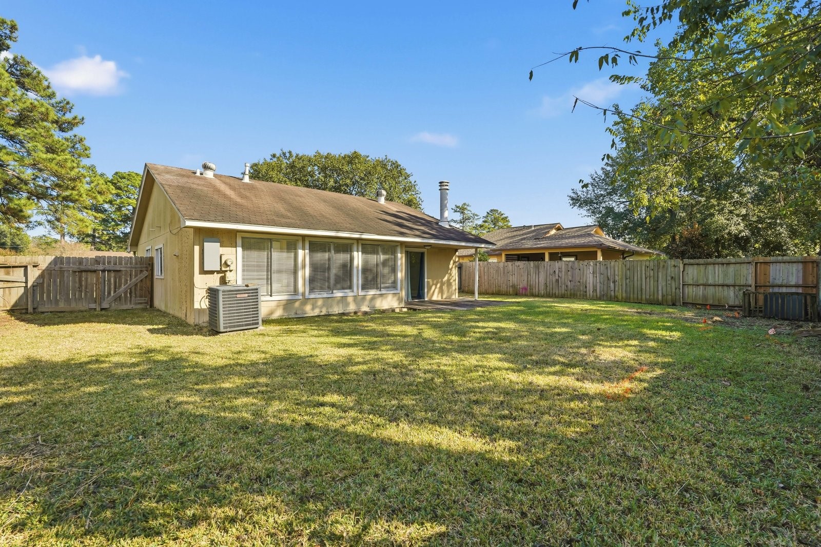 16235 Cutten Road Houston, TX 77070 - Photo 22 of 25 a front view of a house with a yard