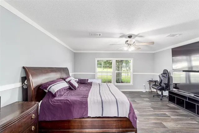 a bed room with a bed and furniture