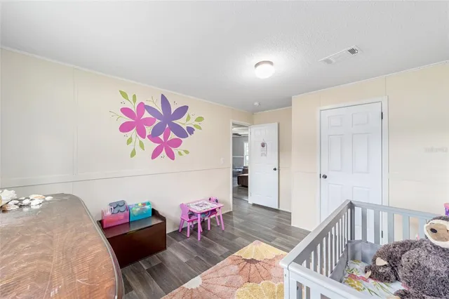 a bedroom with furniture and a couch