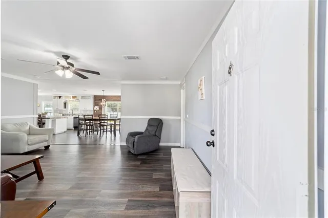 a view of kitchen and dining room with wooden floor