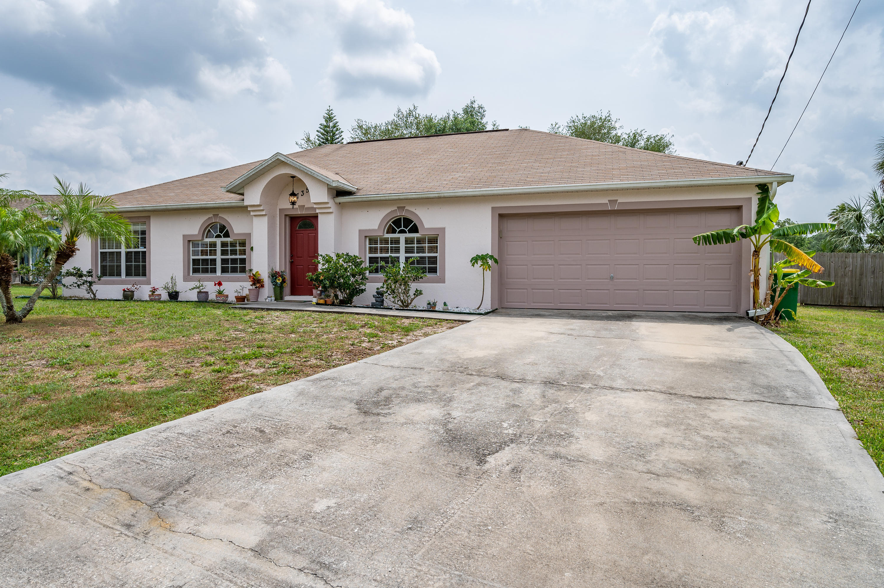6735 Bryant Road Cocoa, FL 32927 - Photo 2 of 28 Long Driveway