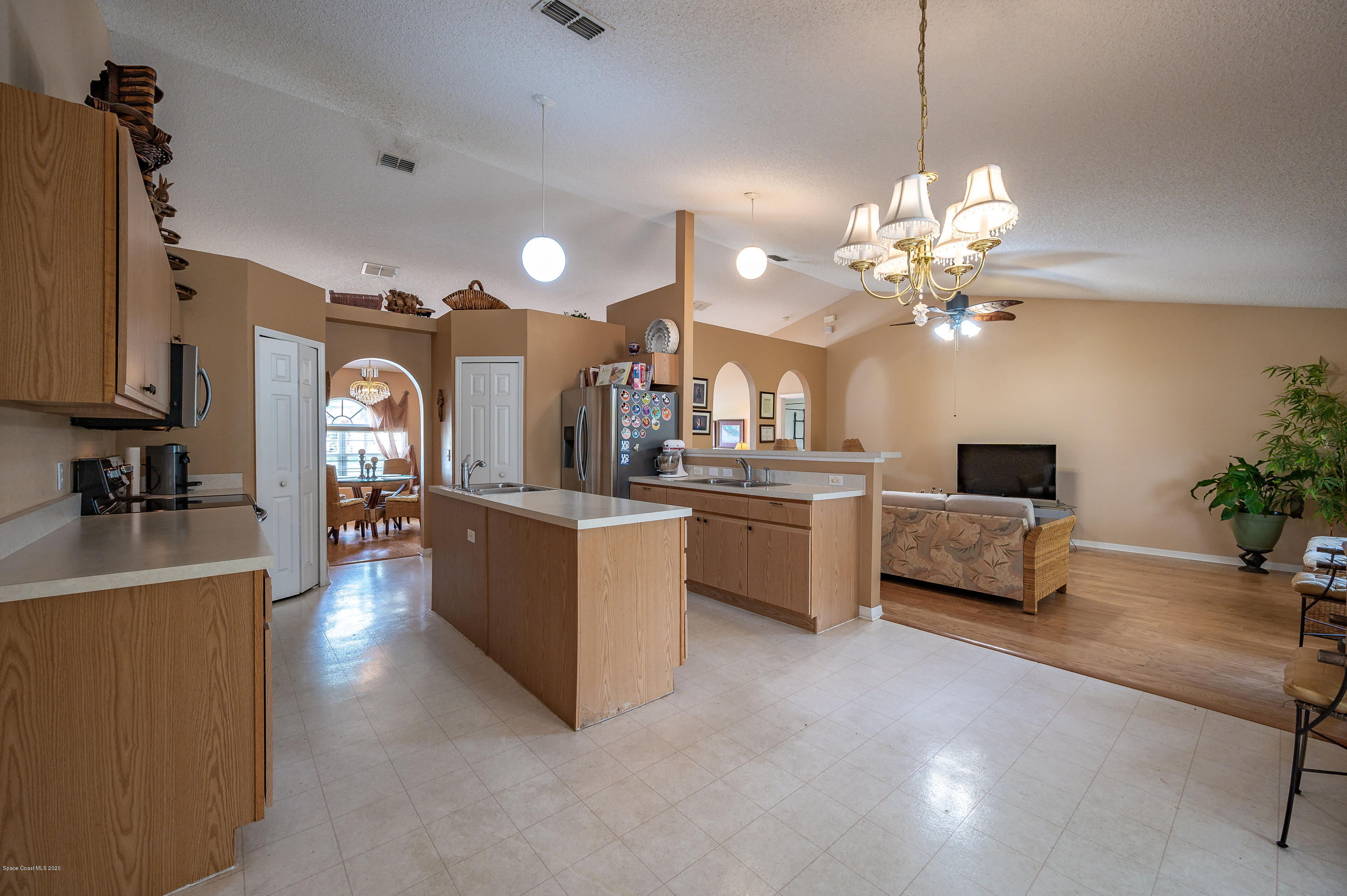 6735 Bryant Road Cocoa, FL 32927 - Photo 12 of 28 Kitchen overlooks Family Room