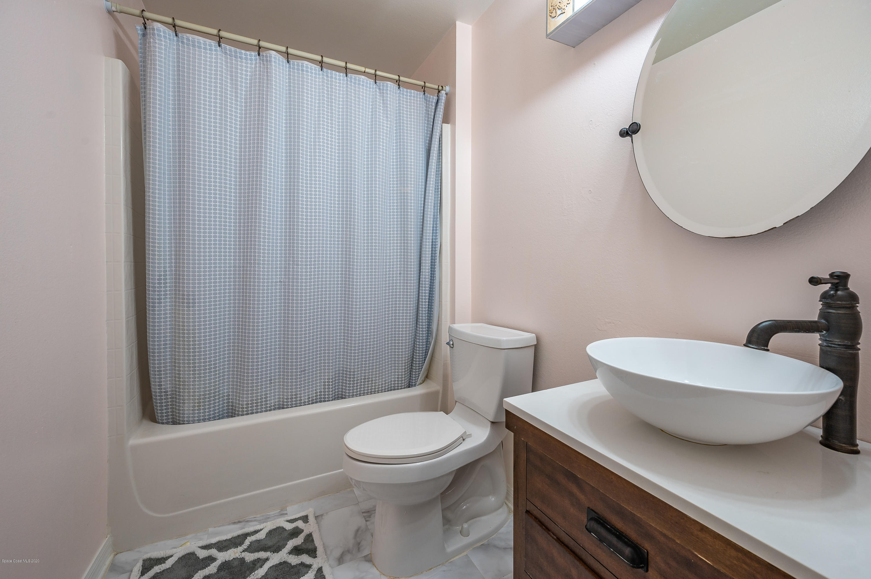6735 Bryant Road Cocoa, FL 32927 - Photo 23 of 28 Hall Bath with upgraded sink