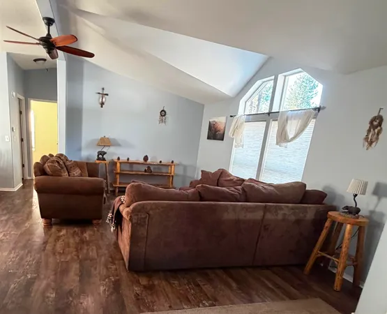 a kitchen with a sink appliances and cabinets