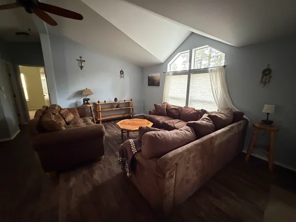 a kitchen with a stove and a refrigerator