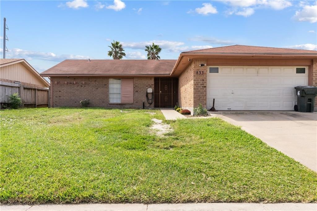 833 Orleans Drive Corpus Christi, TX 78418 - Photo 2 of 18 a view of a house with a yard