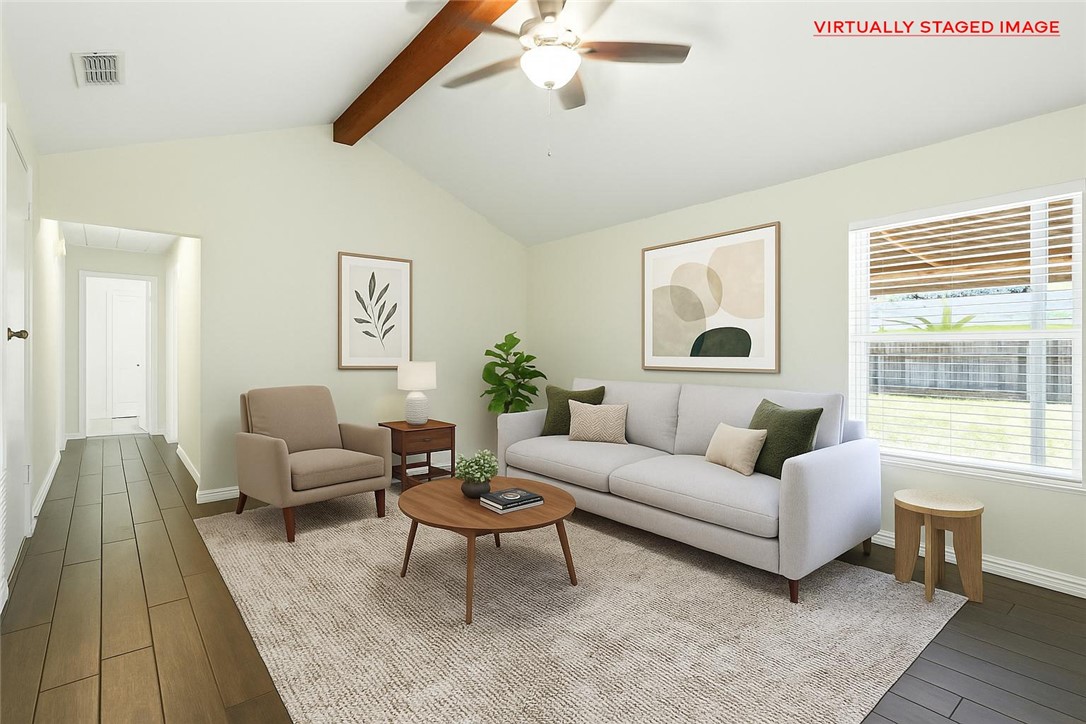 833 Orleans Drive Corpus Christi, TX 78418 - Photo 7 of 18 a living room with furniture and a large window