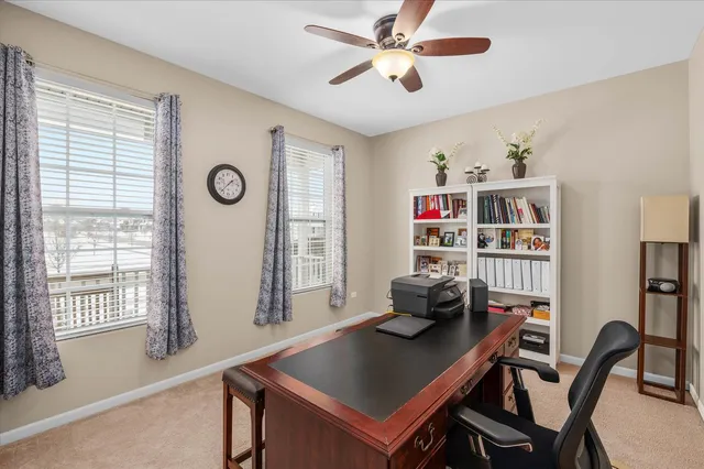 a bathroom with a sink a toilet a mirror and shower curtain