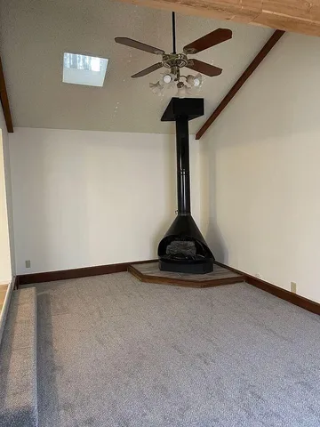 a view of a hallway with a chandelier