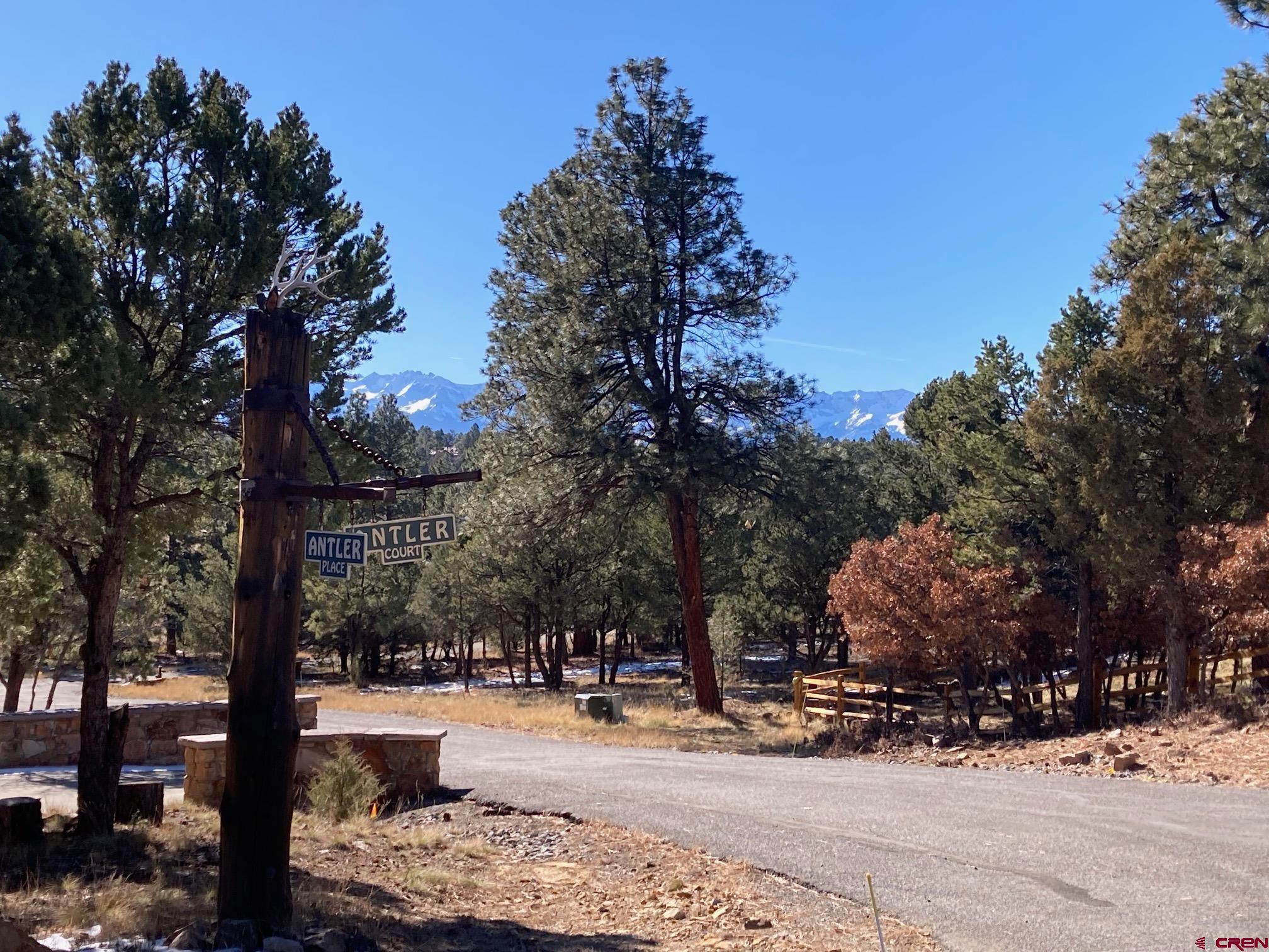 Lot 255 Antler Place Ridgway, CO 81432 - Photo 18 of 18 a outdoor space with lots of trees in the background