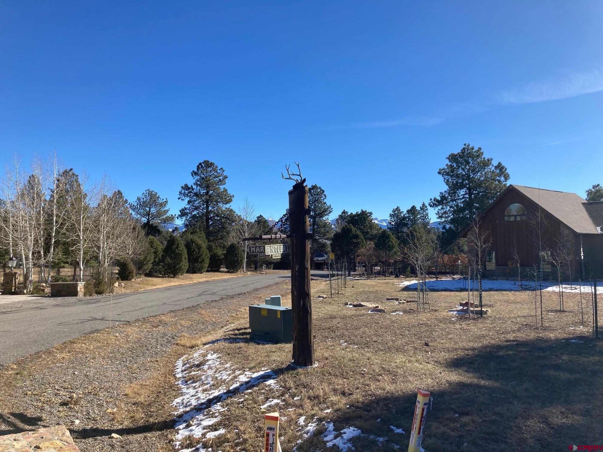 Lot 255 Antler Place Ridgway, CO 81432 - Photo 2 of 18 a view of a road with a building in the background