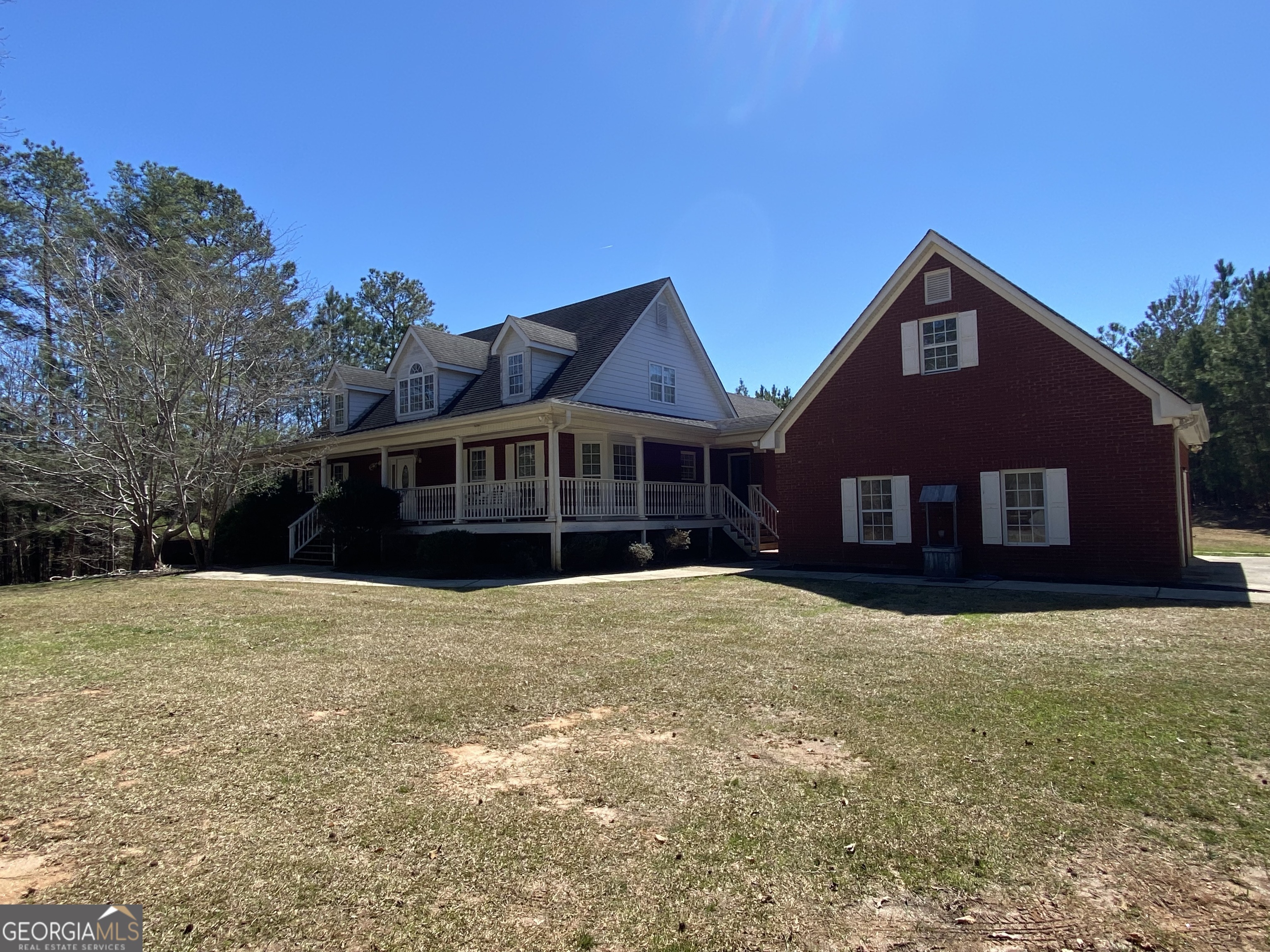 4925 Cool Springs Road Winston, GA 30187 - Photo 1 of 1 a front view of a house with yard and trees