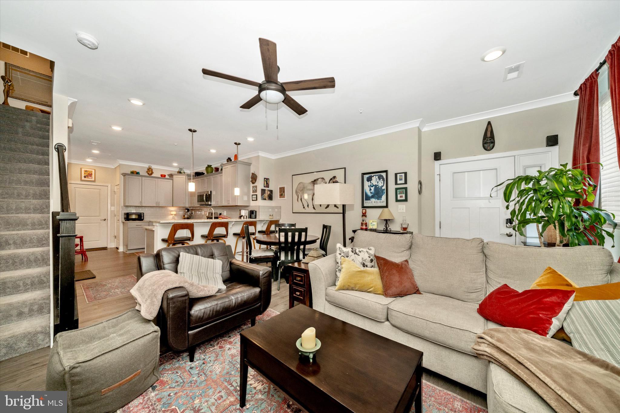 7920 Potter Place, Unit 920B Elkridge, MD 21075 - Photo 11 of 57 a living room with furniture and a potted plant