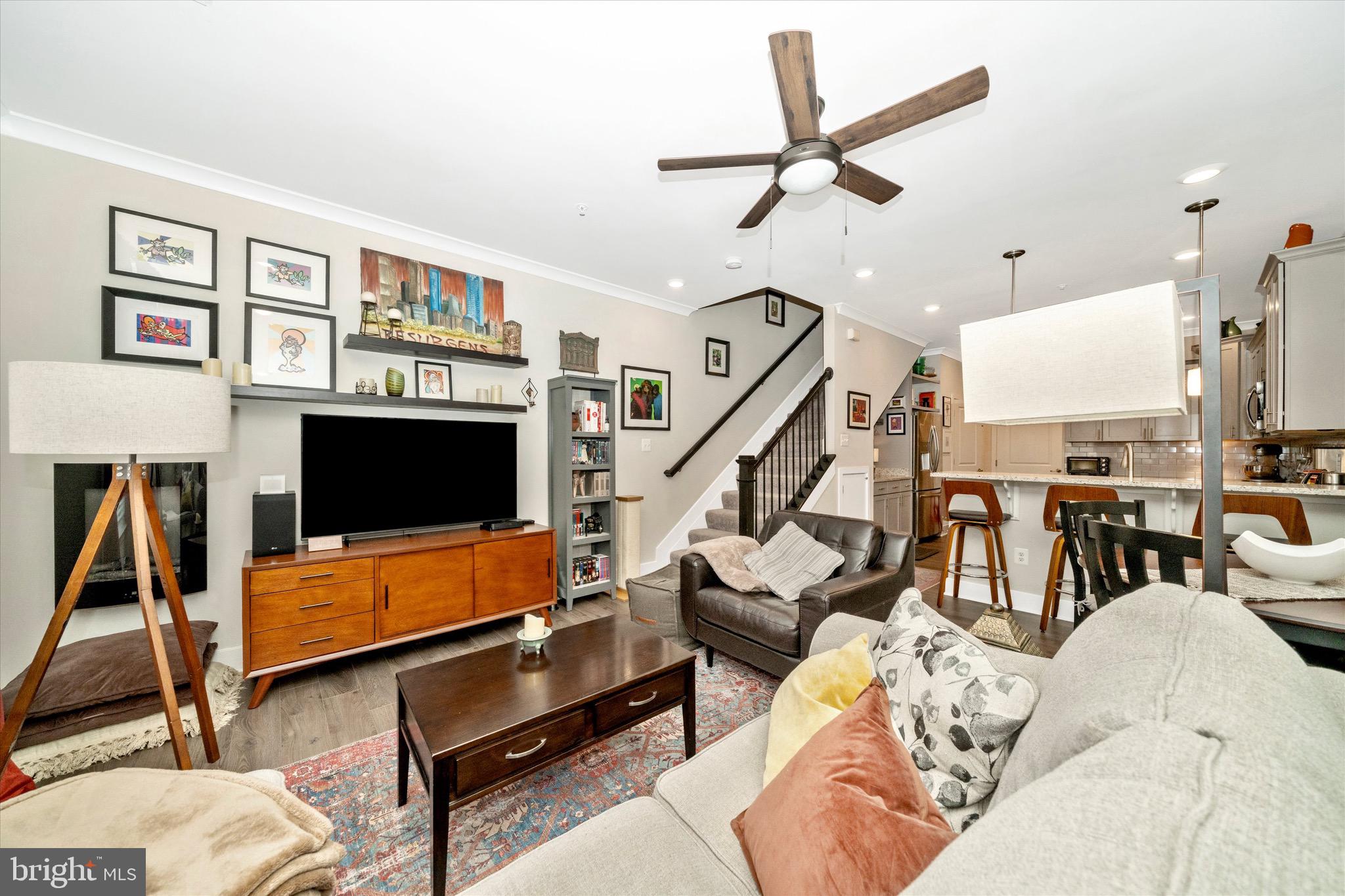 7920 Potter Place, Unit 920B Elkridge, MD 21075 - Photo 12 of 57 a living room with furniture and a flat screen tv