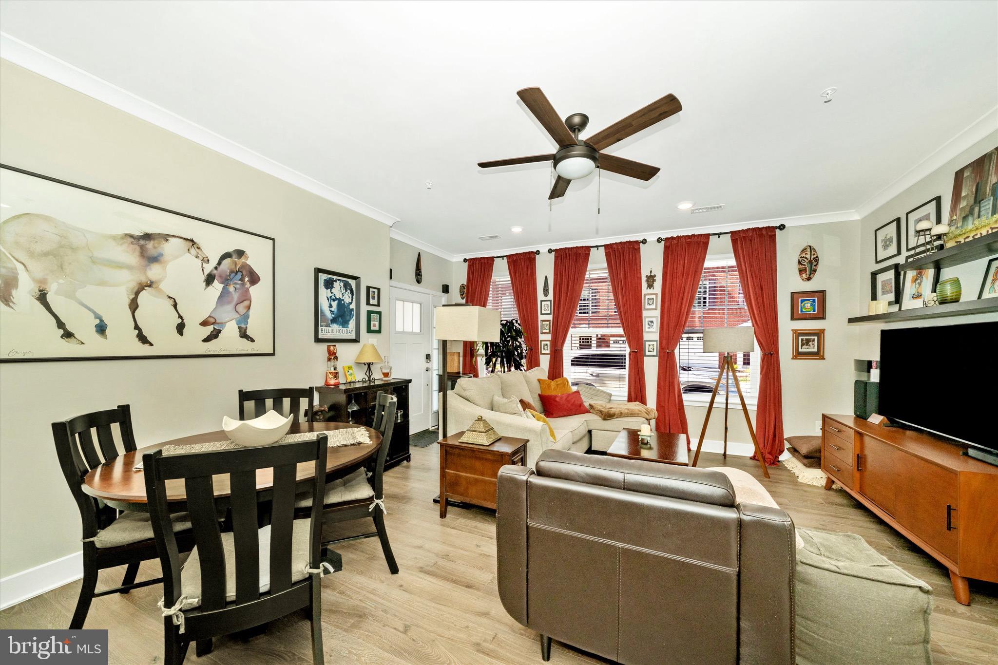 7920 Potter Place, Unit 920B Elkridge, MD 21075 - Photo 25 of 57 a living room with furniture and a flat screen tv