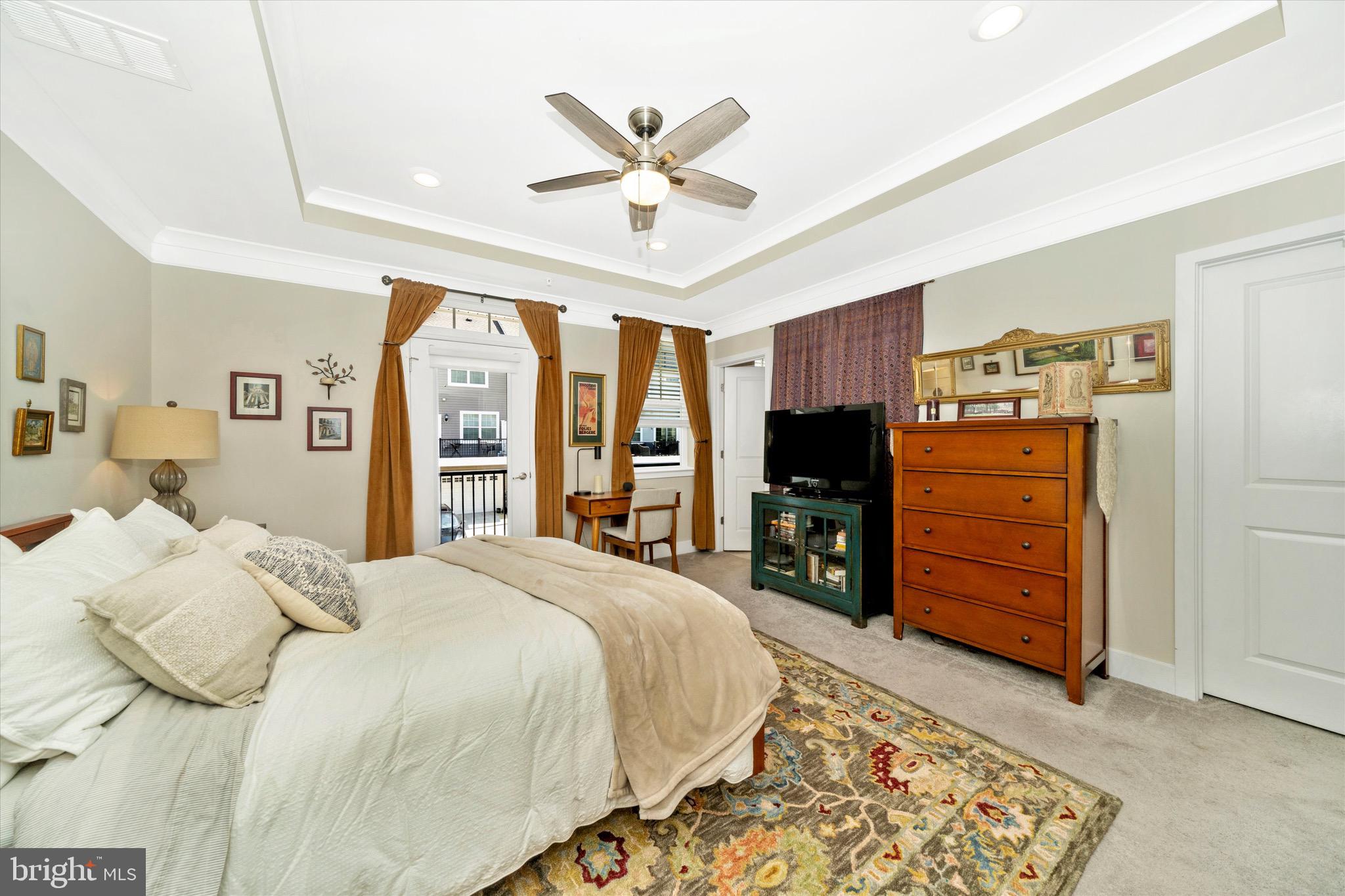 7920 Potter Place, Unit 920B Elkridge, MD 21075 - Photo 27 of 57 a bed room with a bed and a television