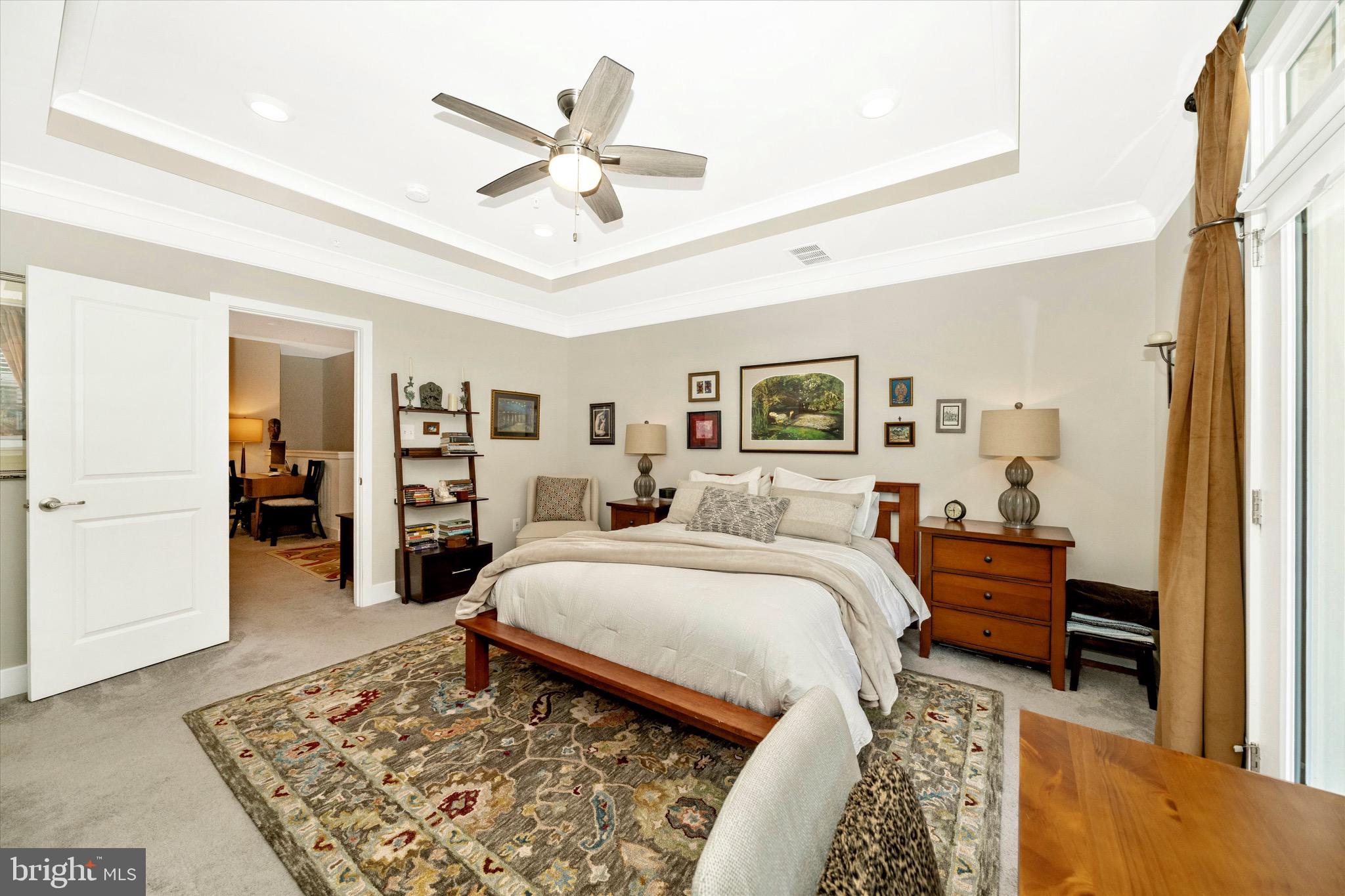 7920 Potter Place, Unit 920B Elkridge, MD 21075 - Photo 29 of 57 a bed room with a bed and a chandelier